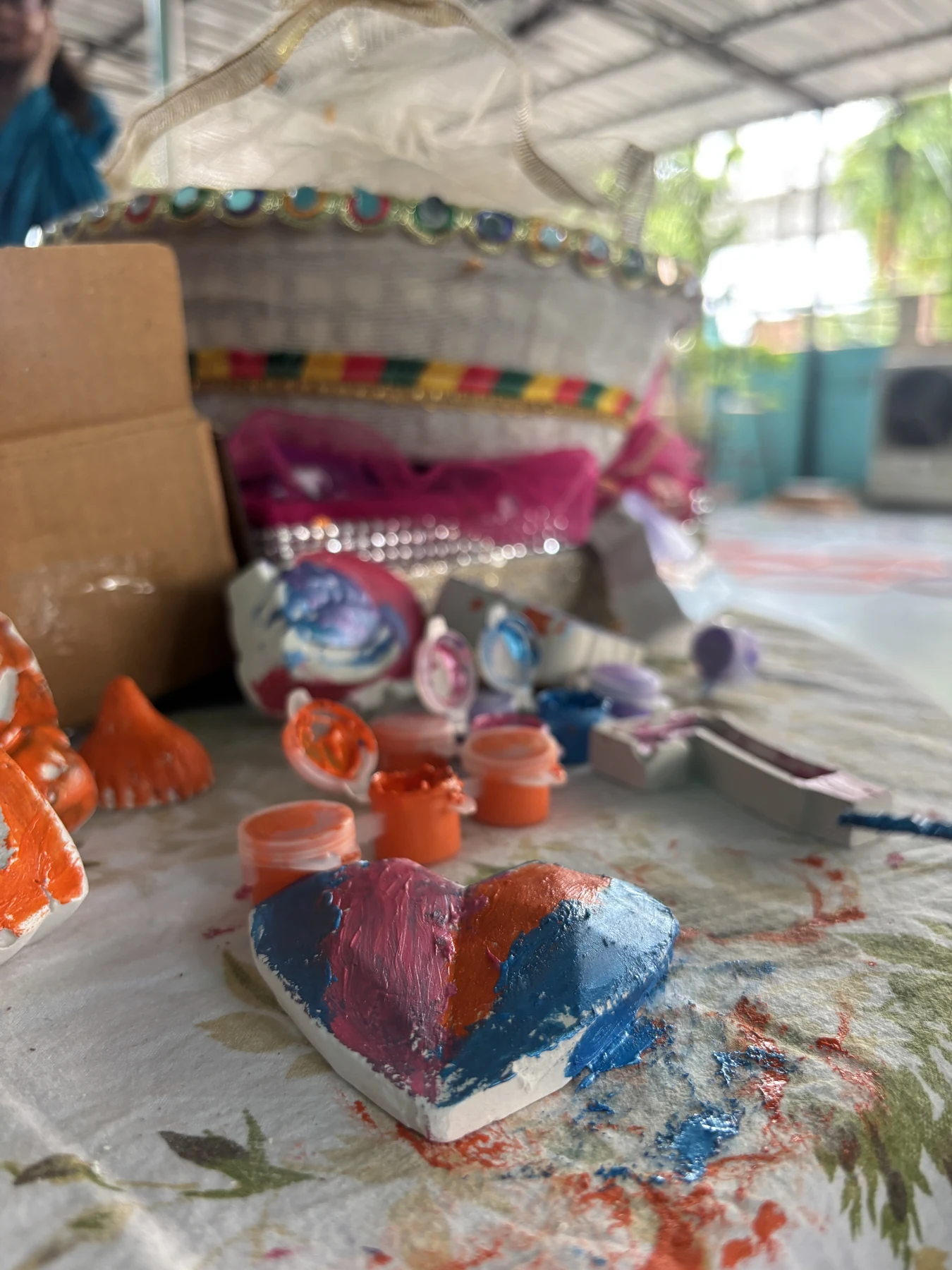 Children gathered around the Archmit Crafts workshop stall