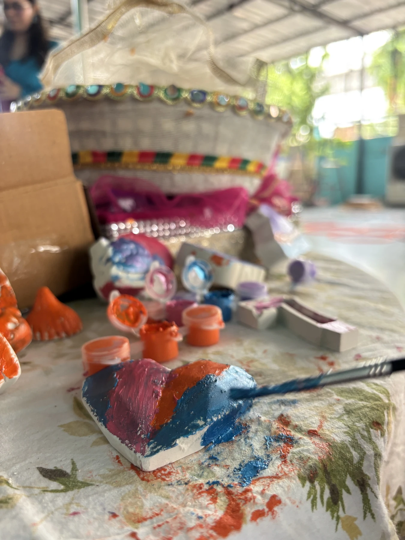 Children painting at the Archmit Crafts workshop